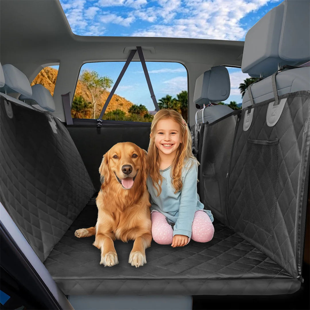 Waterproof dog car seat cover with a child and a golden retriever sitting on it in a car backseat.